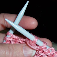 Slip, yarn back as to knit